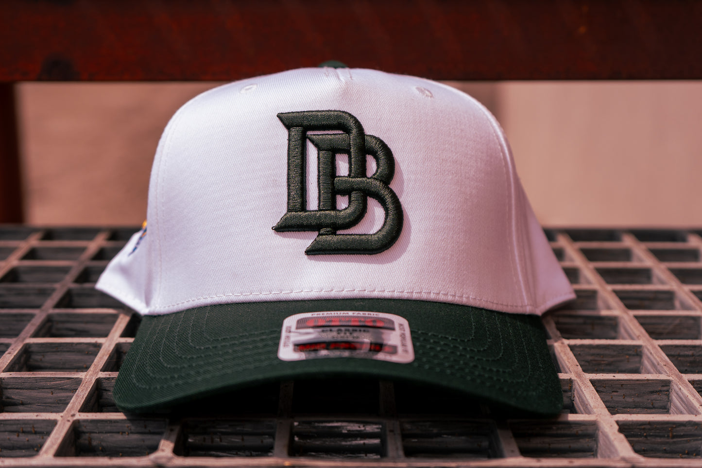Downey Bombers x Chalio’s Sporting Goods – White/Forest Green Collab Hat