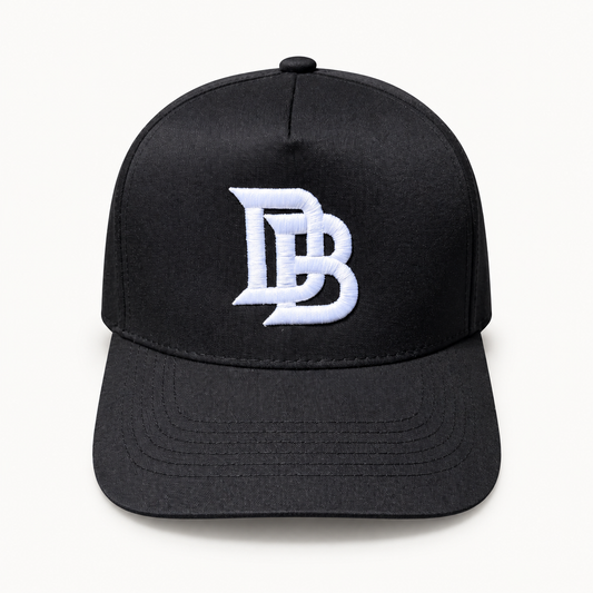 Black DB Snapback, digitally retouched product photograph on a neutral background.